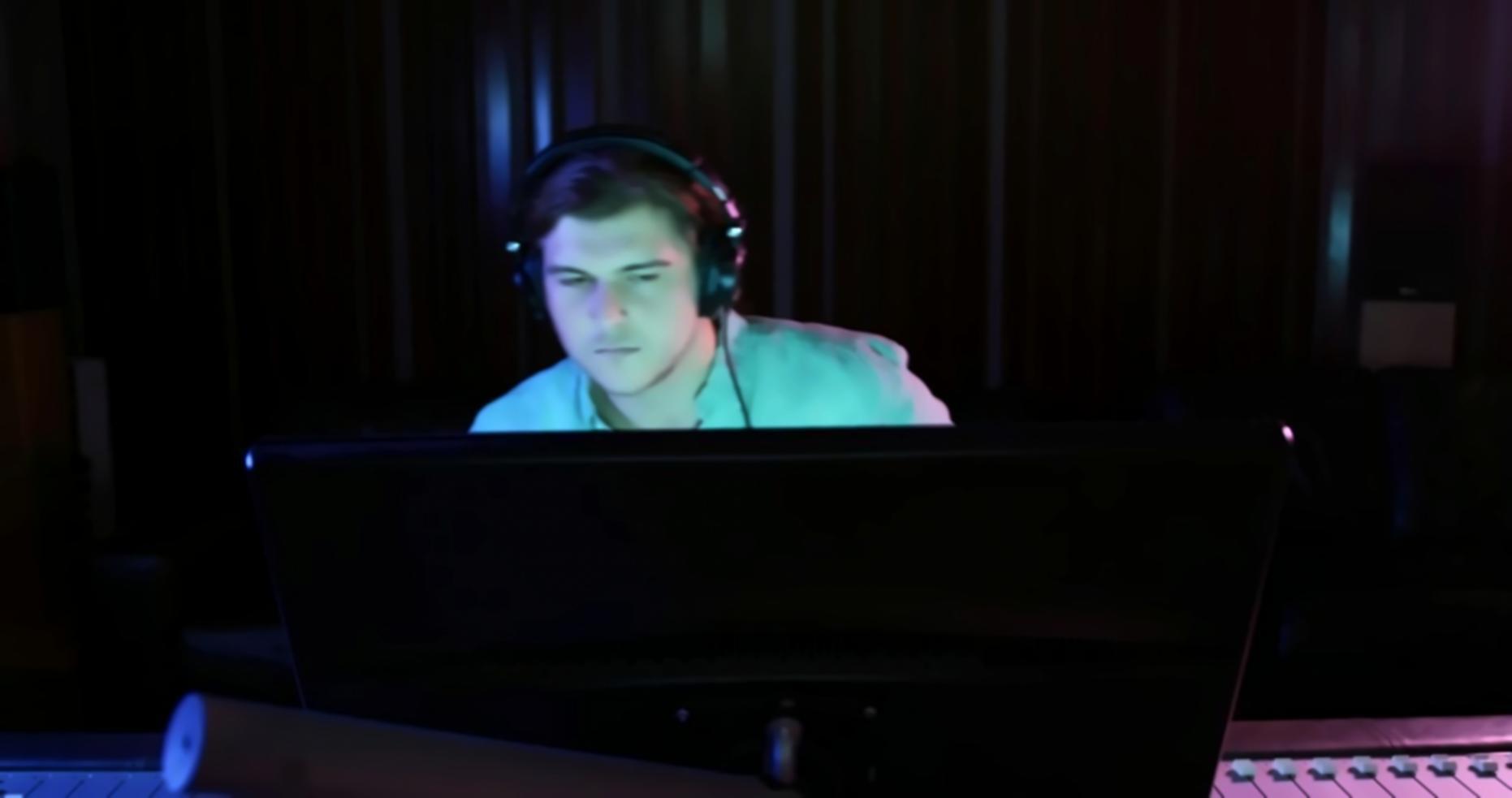 Testing lab setup with multiple monitors showing code debugging tools